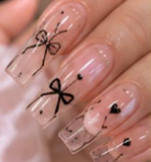 Clear nails with black bow and heart designs